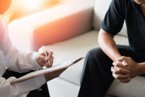 A man talking to a doctor about a penile implant 