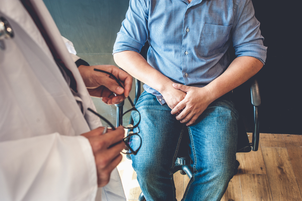 Man having a consultation with his doctor about testicular cancer.